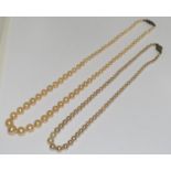 2 x antique clasped pearl necklaces.