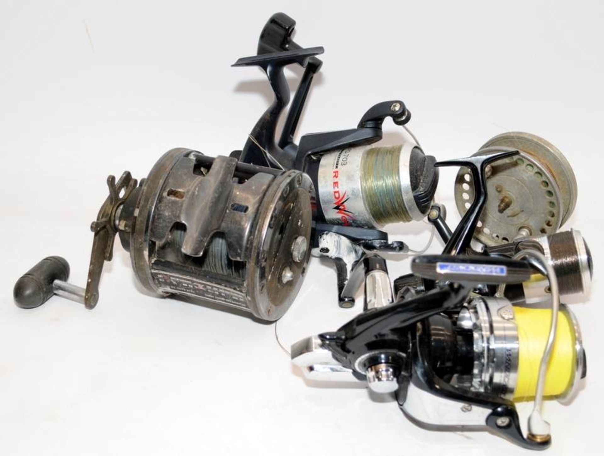 A collection of fishing reels to include fixed spool, centrepin and multiplier examples