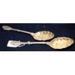 Pair silver plate berry spoons with gilded bowls