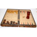 Vintage English Sports backgammon board in the form of a closed book with turned wood pieces and