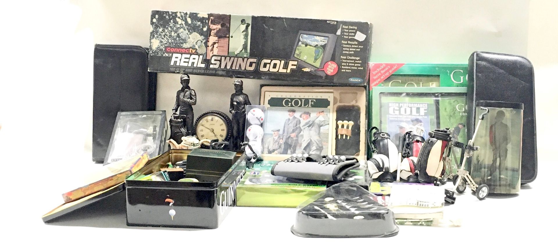Box containing a large collection of golfing related memorabilia to include games, practice