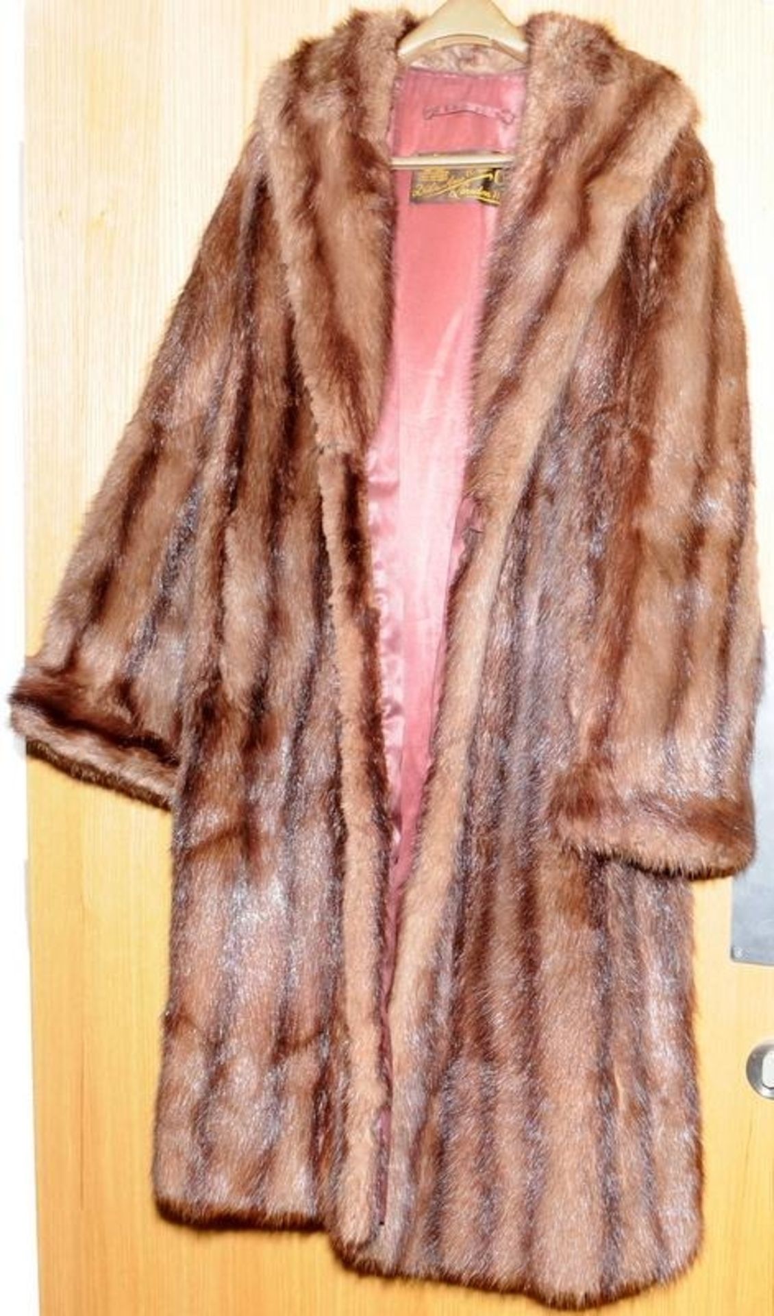 Top quality fur coat by Debenham & Freebody, London, by appointment, drapers to the Queen. Appears