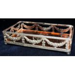 Silver plate galleried tray on bun feet