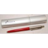 Collectable Parker ballpoint pen with coral red body