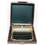 Vintage Remington Travel-Riter typewriter in original case