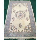 Large Chinese beige and blue patterned wool carpet 275x181cm.