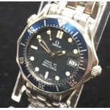 Omega Seamaster Professional, mid-size gents quartz watch. Blue dial and bezel. Comes with