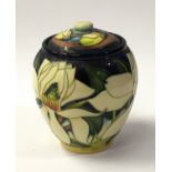 Moorcroft lidded vase possibly Flag Iris or Lily pattern designed by Emma Bossons. Signed, stamped