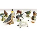 A collection of Beswick birds and farm animals along with a Royal Doulton mallard. 10 figures in all