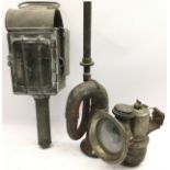 Early motorcar horn c/w an early Powell & Hanmer car lamp and another early carriage/car lamp. Three