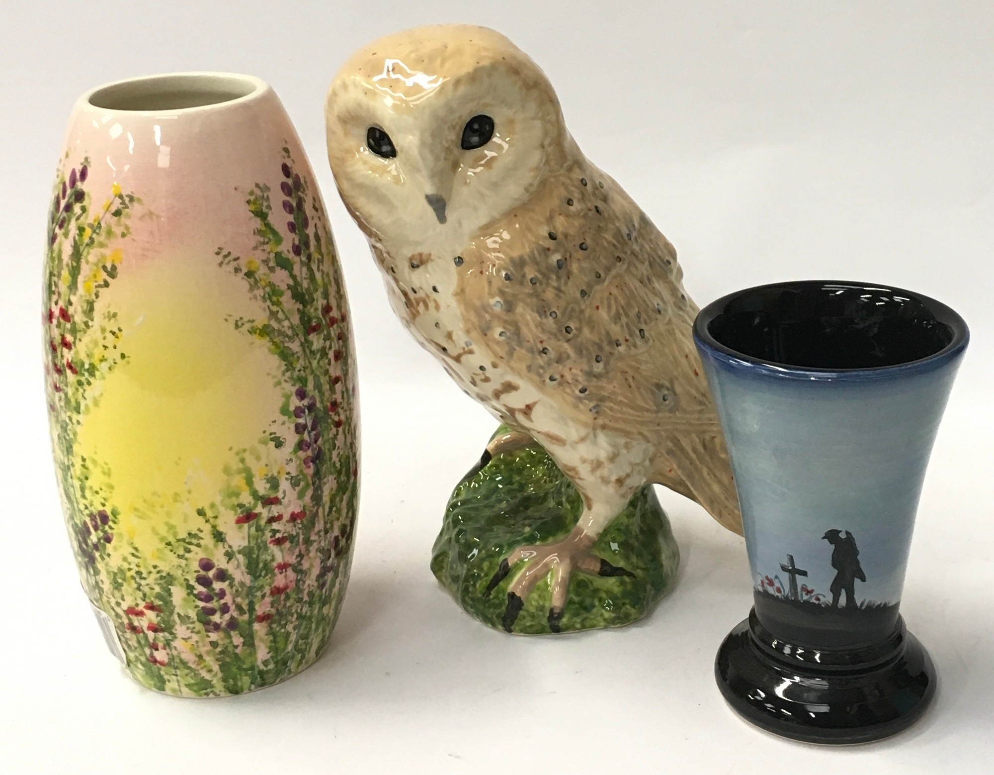 Studio Poole model of an Owl, together with a small remembrance vase by Alan White & Lorna Whitmarsh