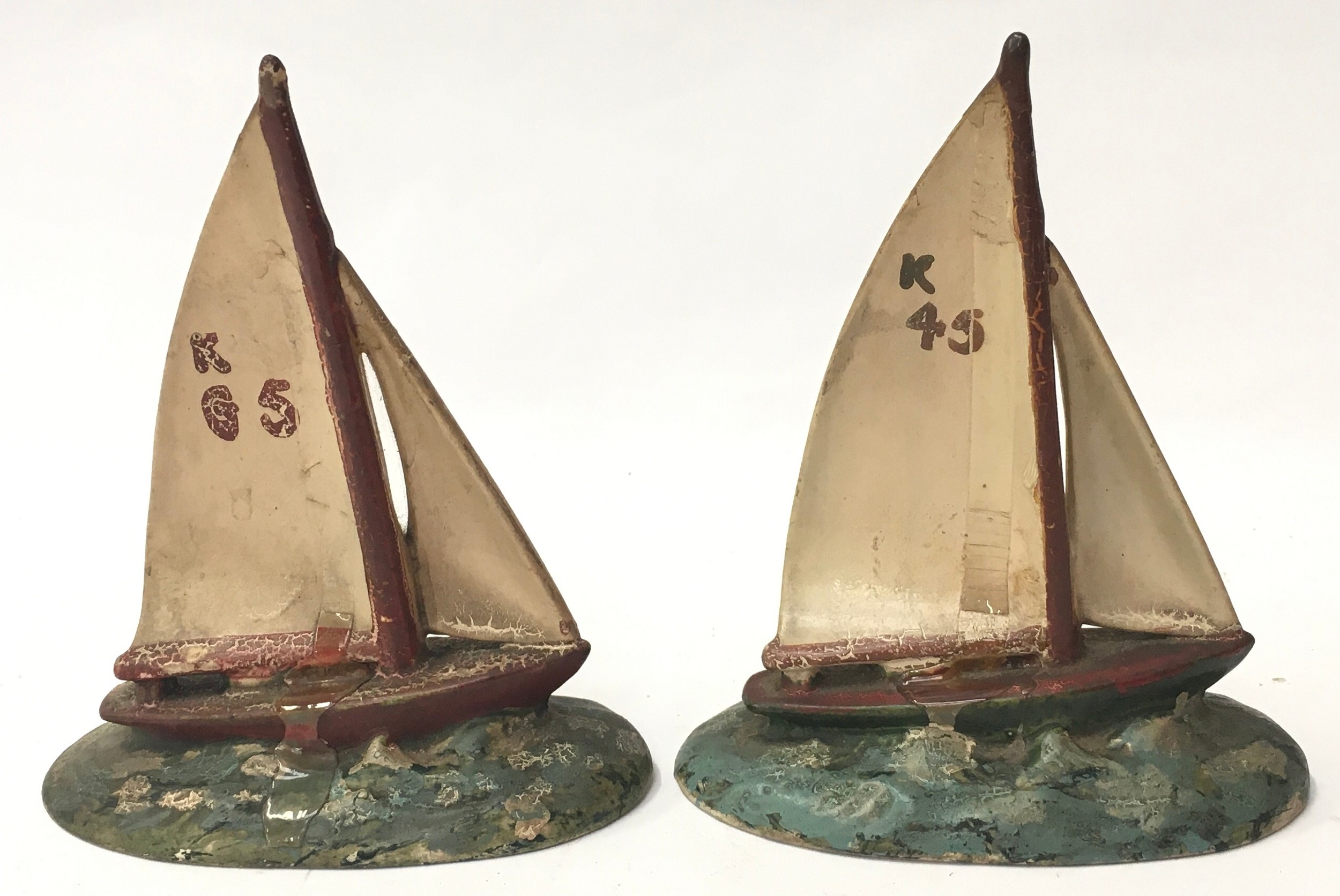 Poole Pottery pair of Yachts (overpainted) 11cms each (2)