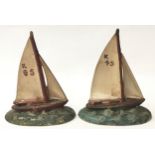 Poole Pottery pair of Yachts (overpainted) 11cms each (2)