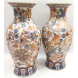 Pair of Oriental baluster form vases. 31cms tall