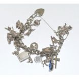 Silver charm bracelet and 20+ charms 82g