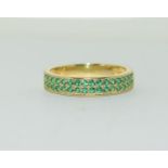 A gold on 925 silver Joubi ring set green stones, Size O