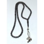 A set of silver inland horn prayer beads