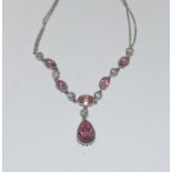 Lovely pink/white gemset w/g on 925 silver drop necklace.