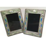 Matching pair of silver and enamel easel back picture frames