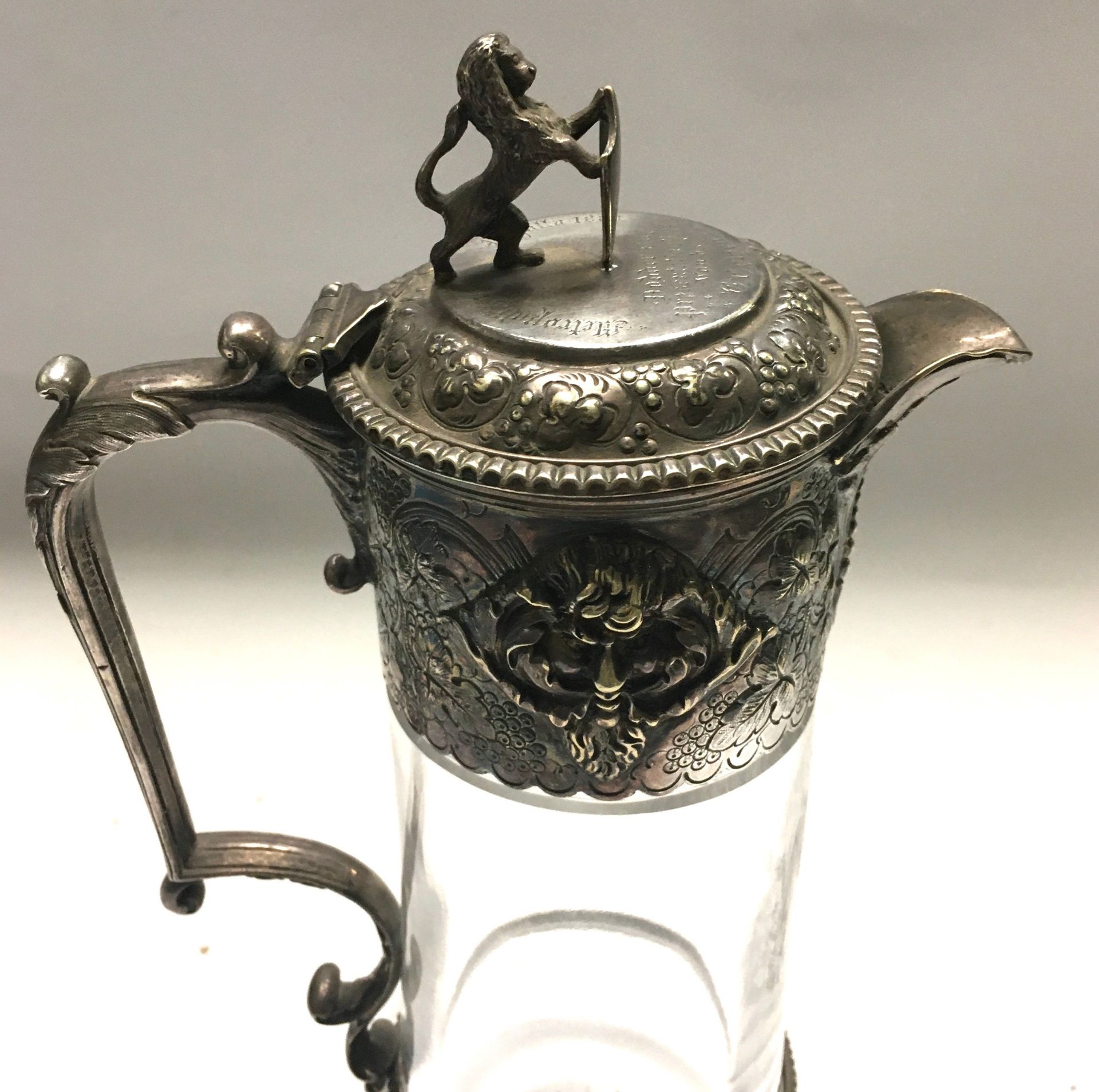 Vintage Claret jug with embossed decoration and Lion finial set as a trophy dated 1880 - Image 2 of 5