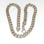 A silver flat link chain (171 grams)