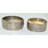 Two antique Victorian white metal bangles.