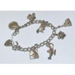 Heavy silver charm bracelet.