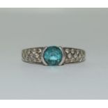 A 925 silver, Cz and blue stone ring, Size S