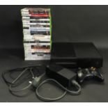 Xbox One console with a controller, power lead and large collection of Xbox games.
