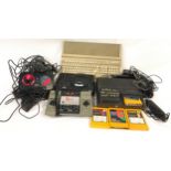Large collection of various vintage gaming consoles, controllers, leads and accessories.