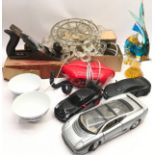 A box of collectibles to include a vintage Gamages electric massage vibrator, Murano fish and a