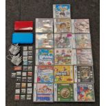 Nintendo collection of two DS handheld consoles together with power supplies and a large