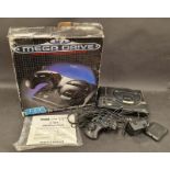 Sega Mega Drive vintage gaming console in original box with controller, leads and paperwork.