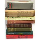 A number of reference books relating to coin collecting