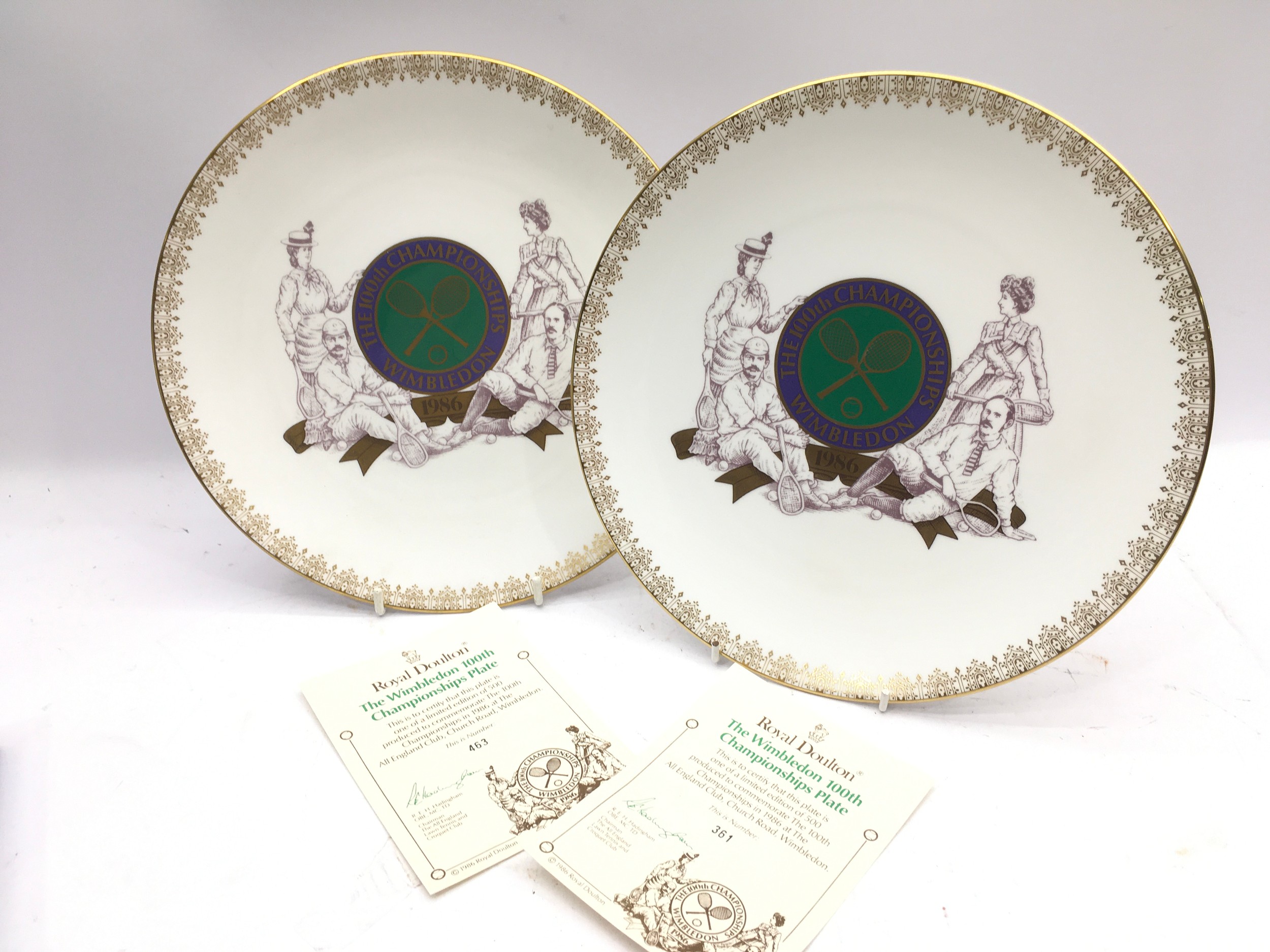 Pair of boxed Royal Doulton cabinet plates celebrating 100 years of Wimbledon Tennis Tournament
