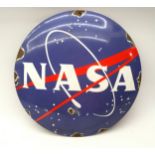 Round enamel NASA sign. 30cm dia.