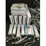 Large Nintendo Wii bundle to include five consoles together with a large collection of controllers