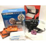Vintage 8mm movie package to include Chinon movie camera, boxed movie lamp, boxed Chinon 2000GL cine