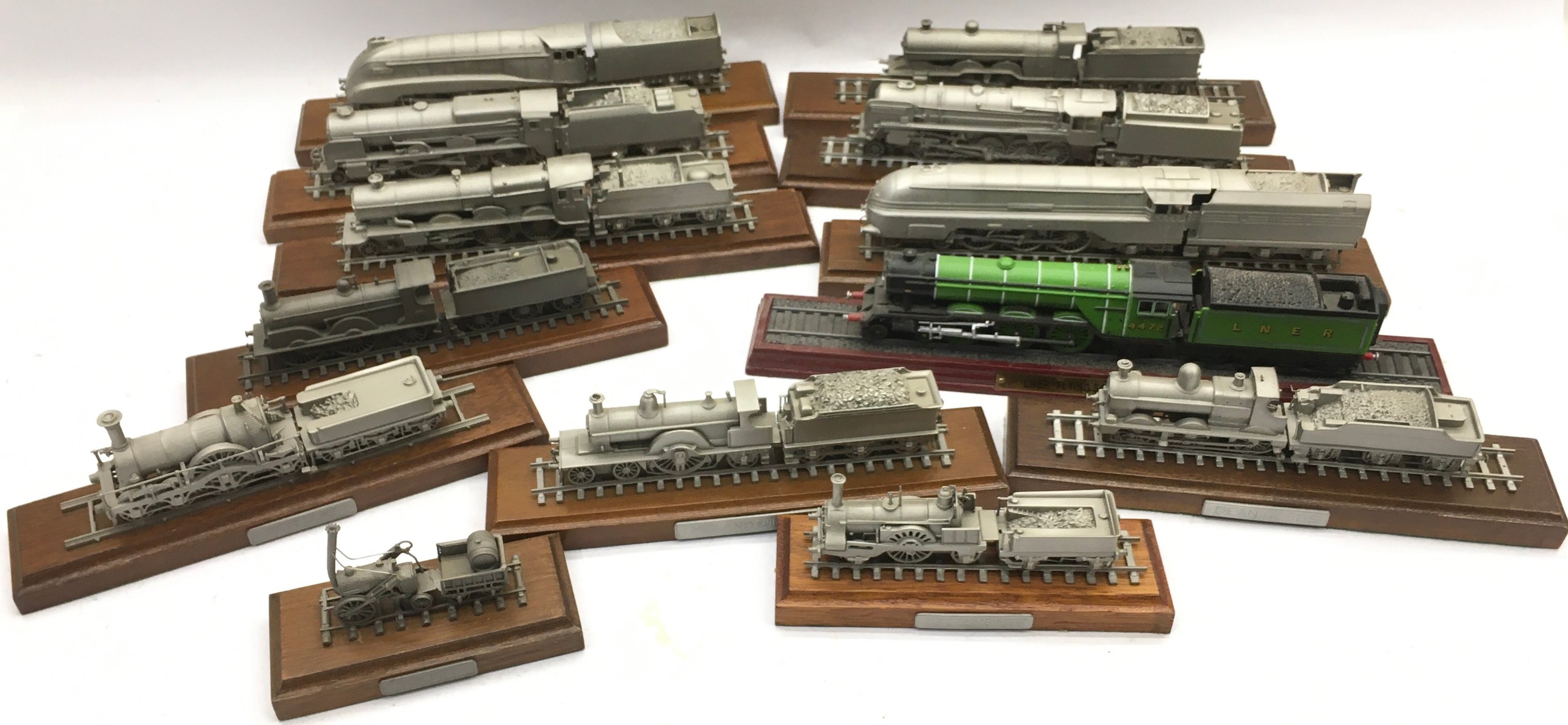 Large collection of static display pewter locomotives 13 in all