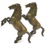 Pair of antique oriental bronze rearing horses. 16.5cms across
