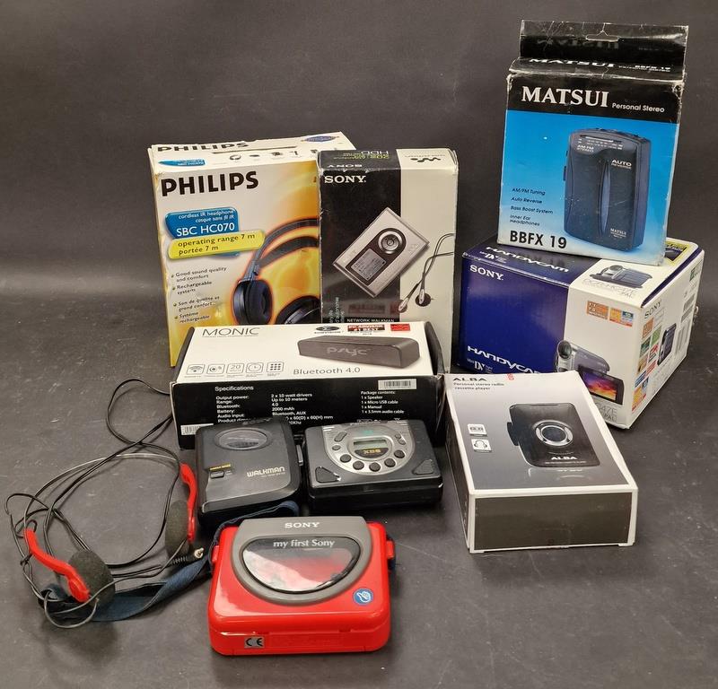 Box of miscellaneous electronics to include camcorder, audio players, Sony Walkman and other items