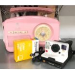 Polaroid instant camera and film, together with a working retro style radio