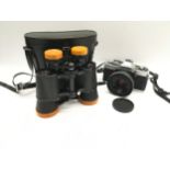 Minolta XG2 35mm SLR camera with fitted Rokkor 45mm lens c/w a pair of Sullivans Safari binoculars