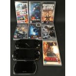 Three Sony PSP handheld consoles together with seven games.