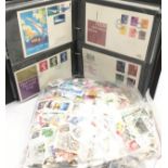 Stamps: Blue album of first day covers c/w a bag of loose stamps to sort ref 72