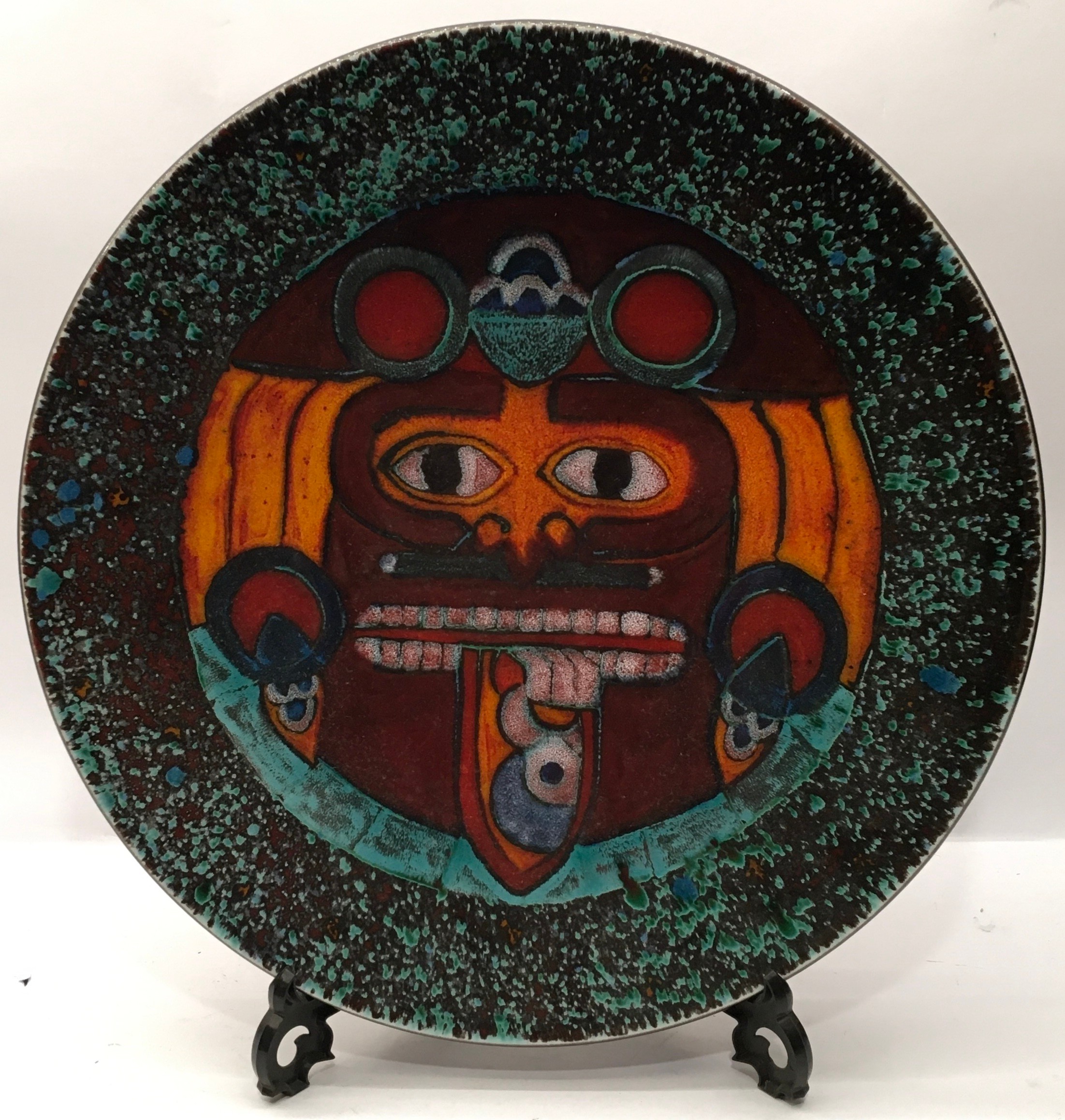 Poole Pottery interest Anita Harris Studio charger depicting an Aztec head 16" dia.