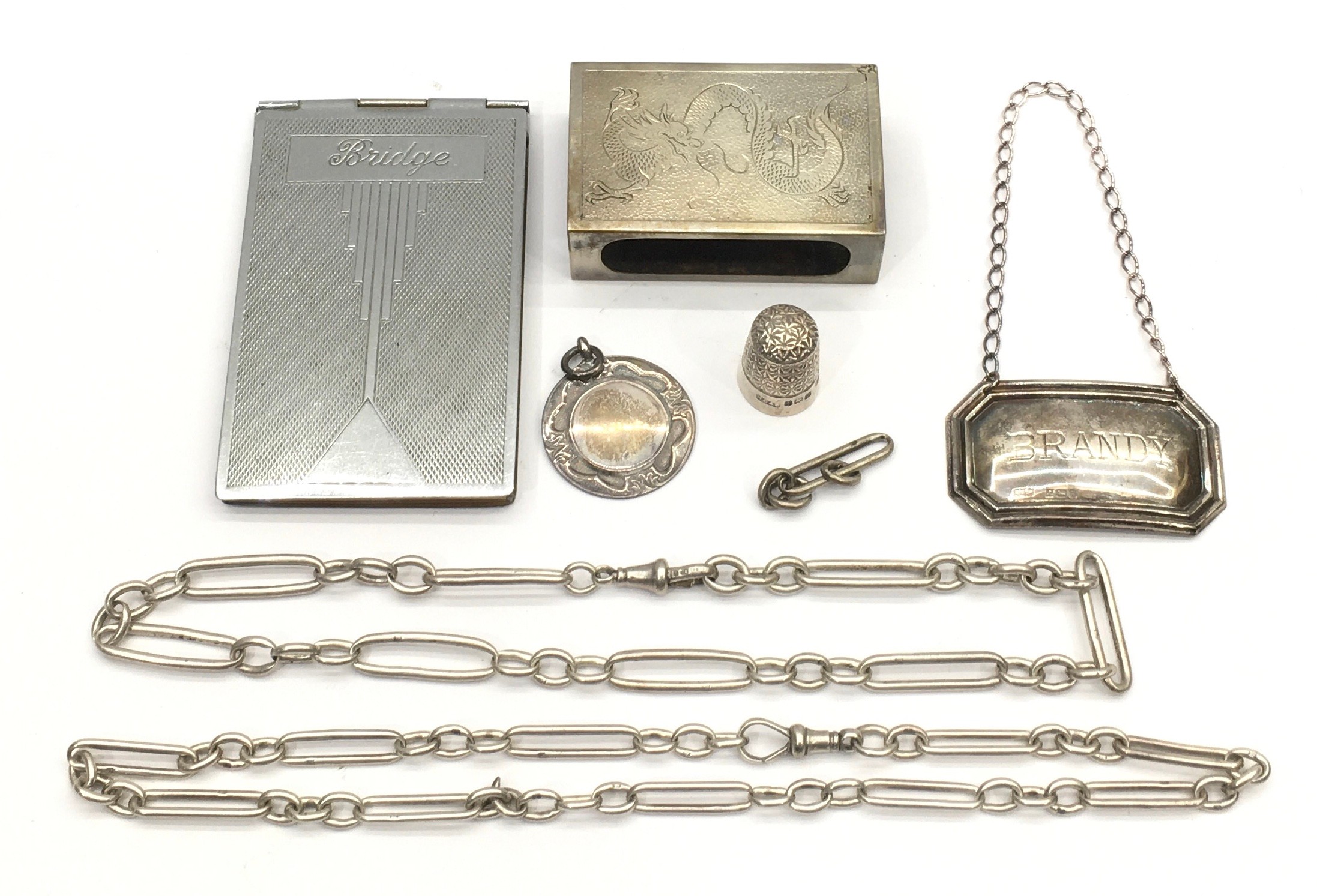 Silver and other curios to include a match box holder and medal