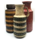 Collection of large West German lava mid century vases the largest measuring 51cm tall.