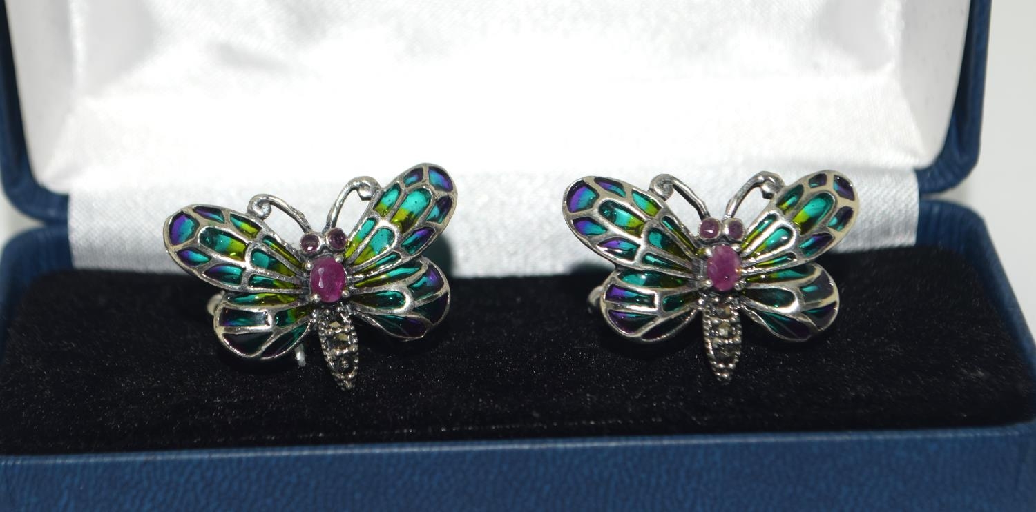 A pair of silver and plique a jour butterfly cuff links (cased)