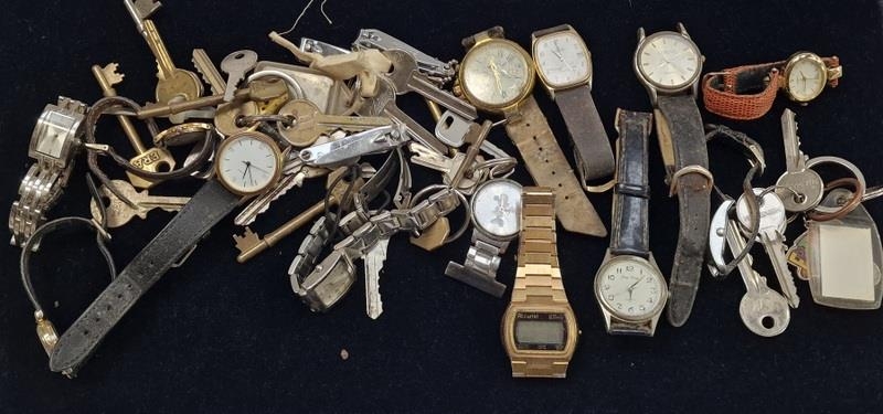 Mixed collection of watches and keys